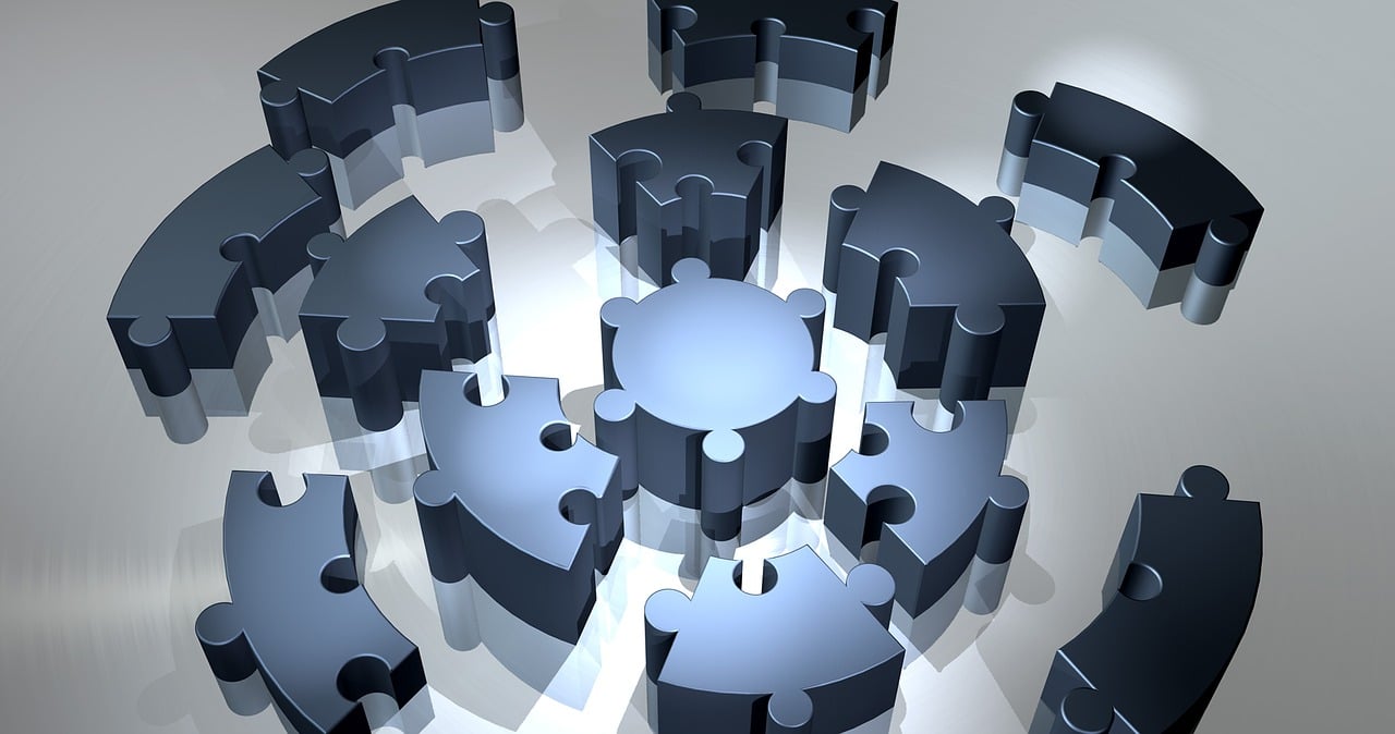 Abstract geometric puzzle pieces fitting together, representing modular system architecture